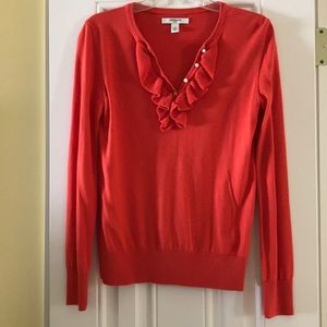 Beautiful orange ruffled sweater